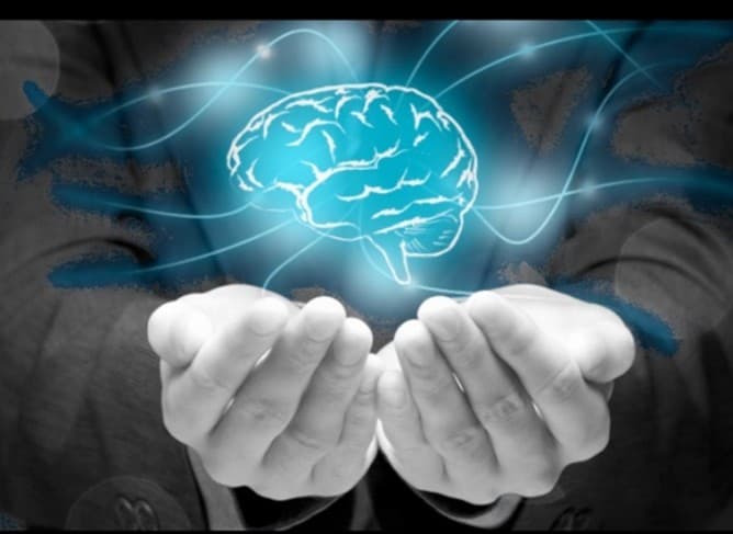 Ilustración abstracta del cerebro con ondas sonoras, representando la neuroplasticidad.